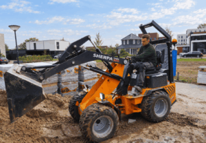 Medewerker Lipsgroen op mini shovel